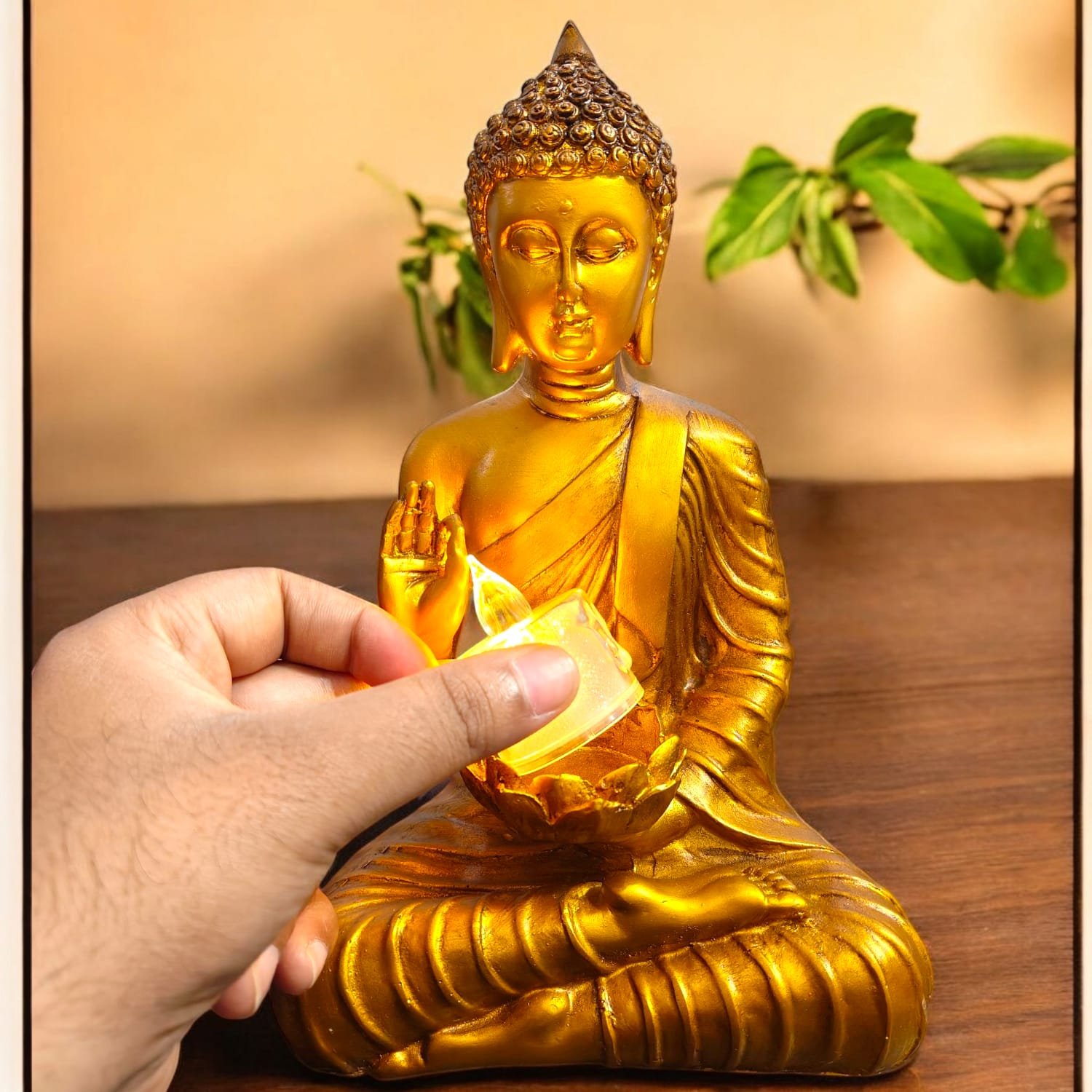 Gold Polyresin Sitting Buddha Idol With Candle Holder (26 X 10 X 15 cm)